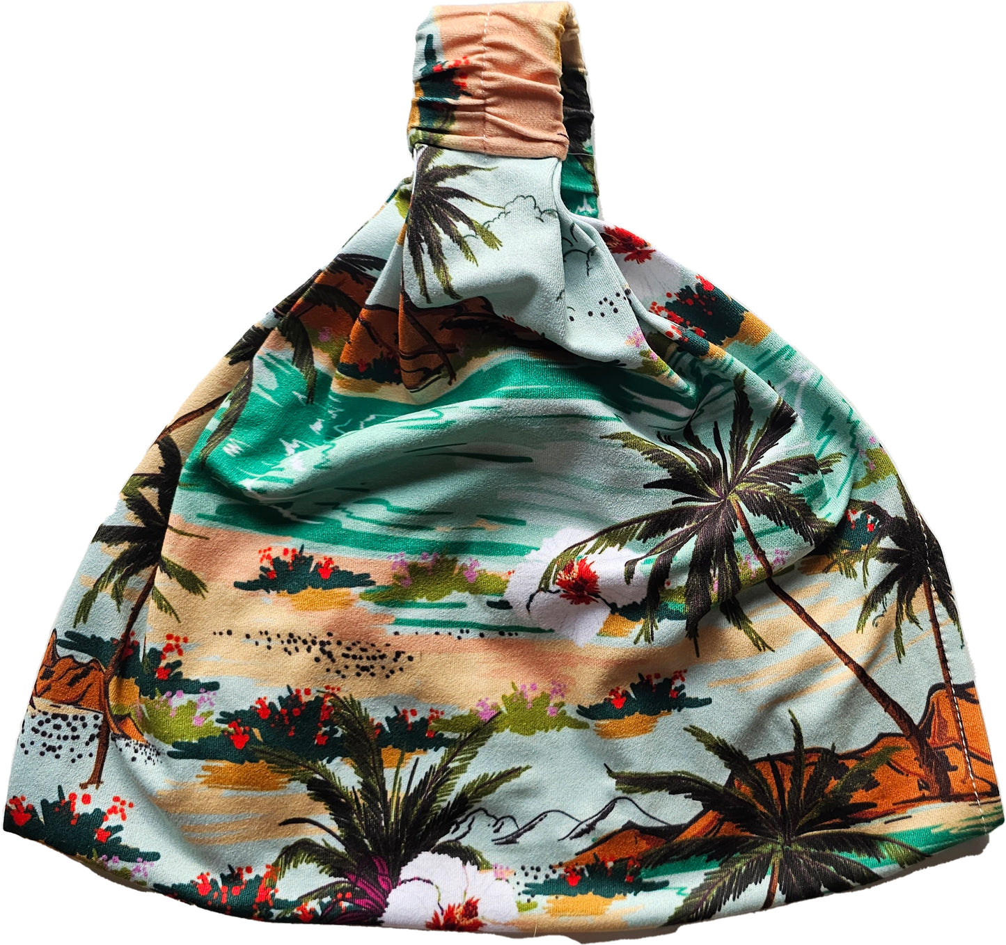 a colorful hat with palm trees on it