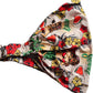 a bow tie with a hula girl hawaiian design  design on it