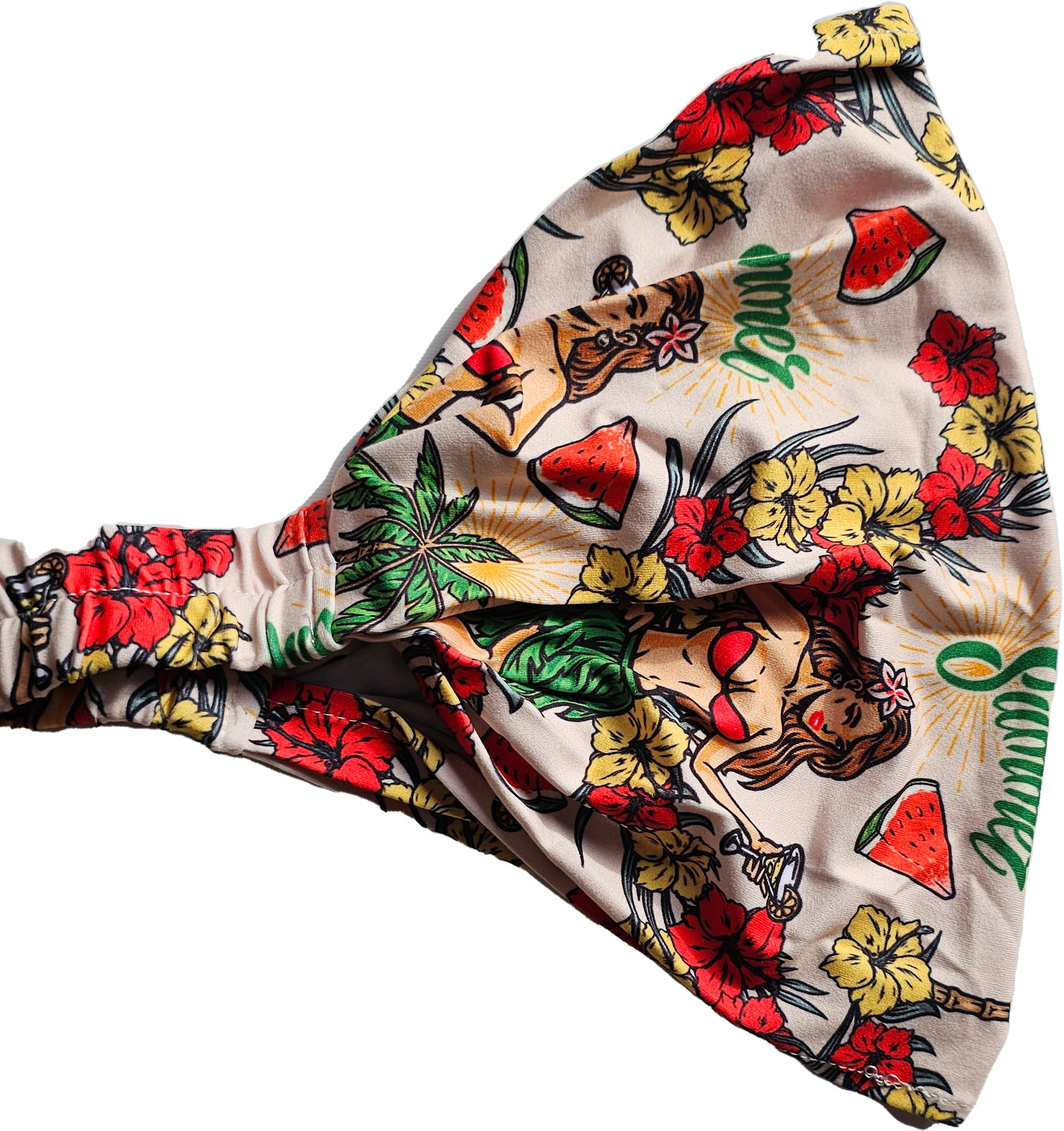a bow tie with a hula girl hawaiian design  design on it